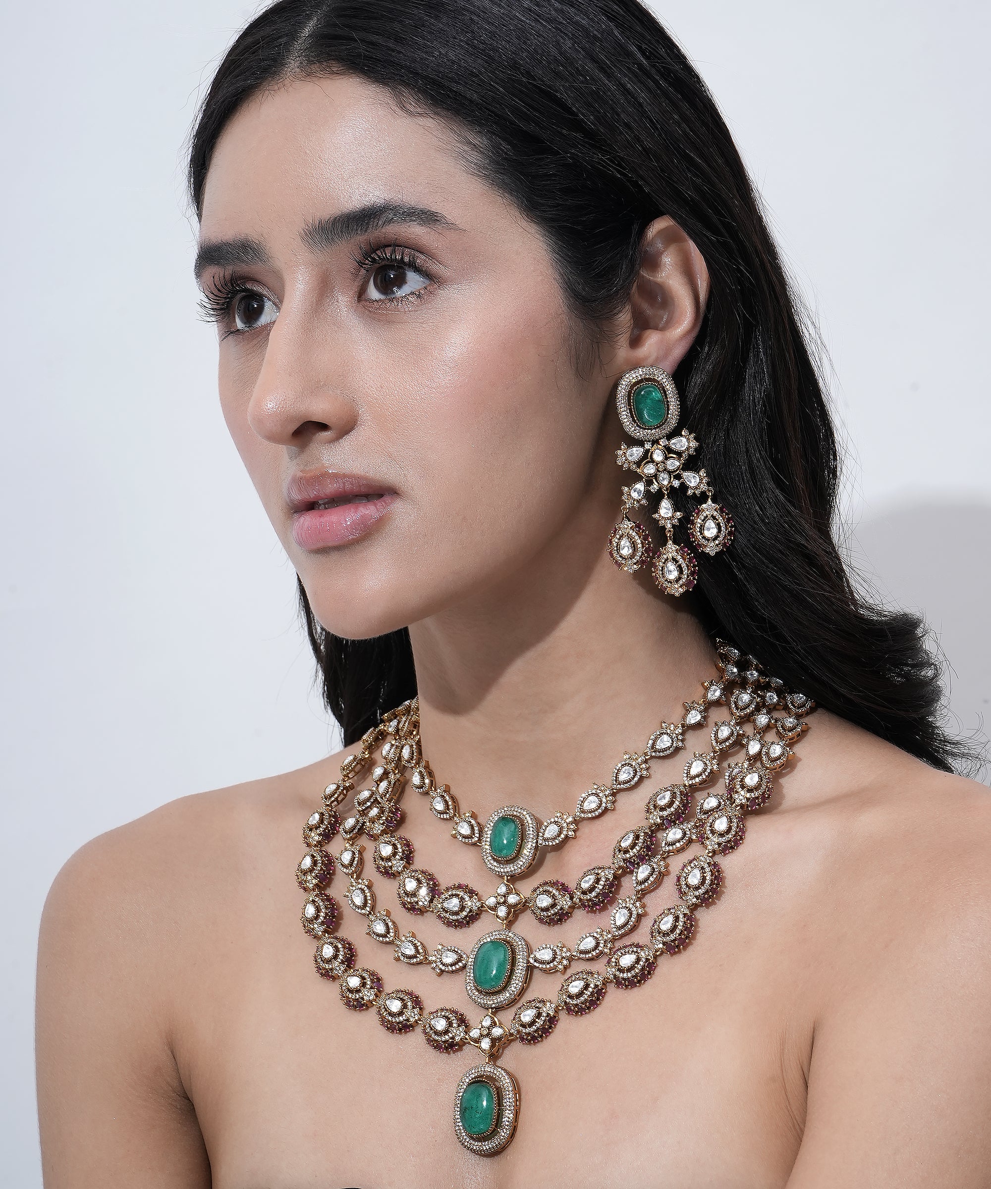 Bridal Moissanite necklace featuring green center stones, pink gemstone accents, and elegant layered design.