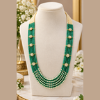 Damani Jewels green crystal and pearl necklace worn with saree