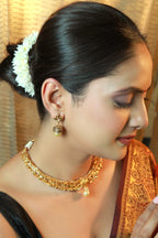 “Antique gold filigree choker necklace set with pearl drop pendant and matching earrings – traditional Indian jewellery.”