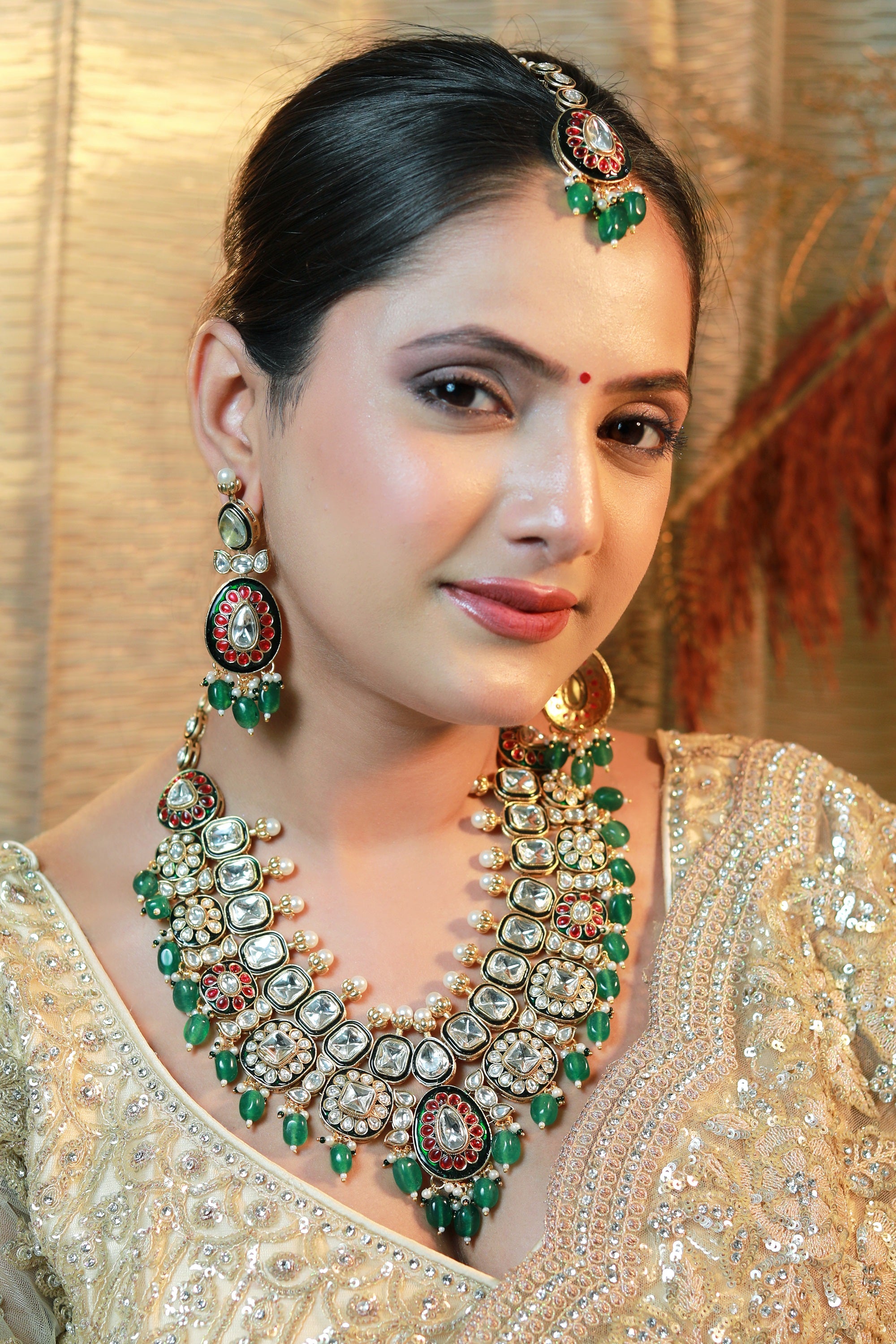 Bridal Kundan necklace set with emerald beads, matching earrings and maang tikka – Indian wedding jewellery.”
