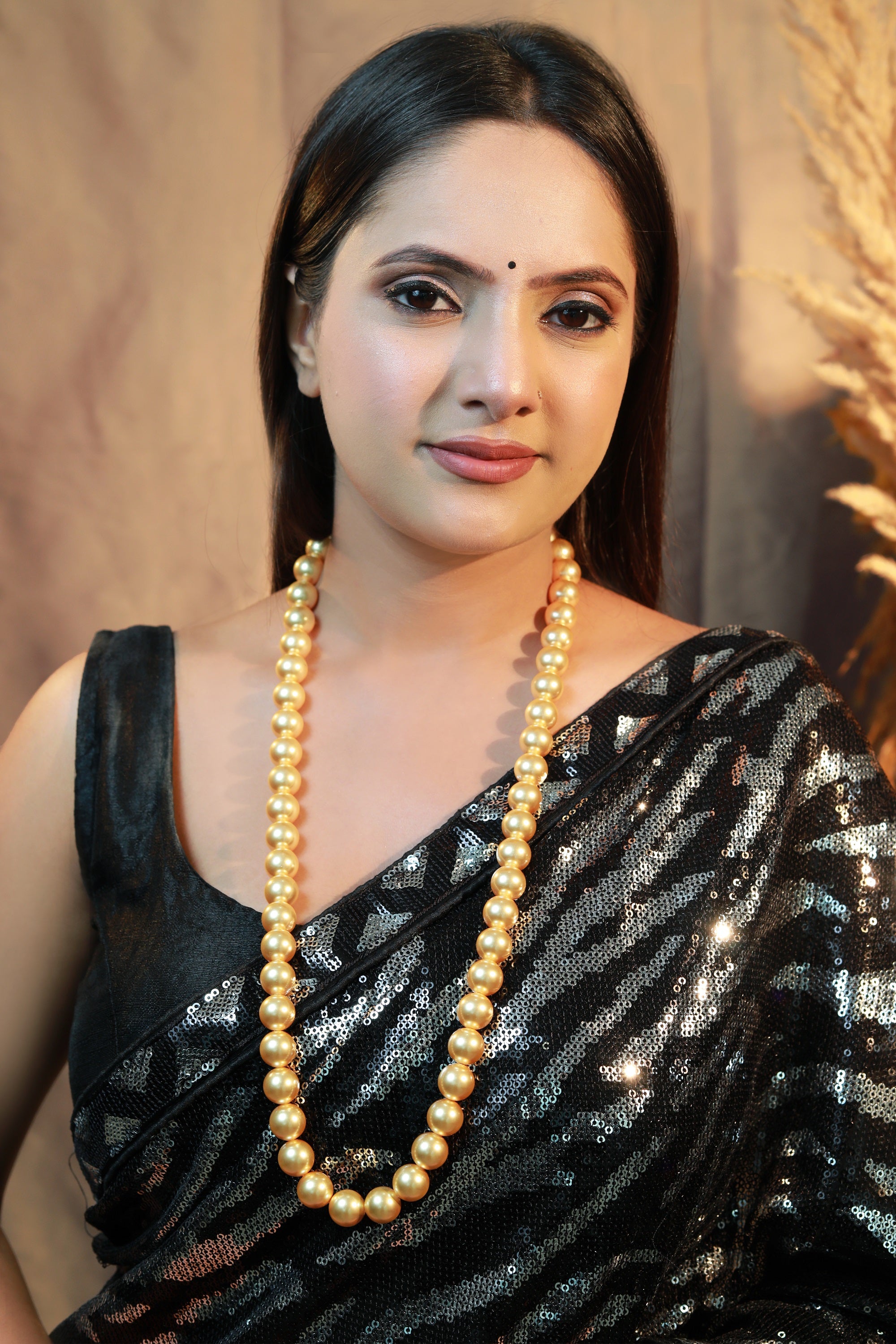 “Swarovski golden pearl beaded mala necklace for women.”