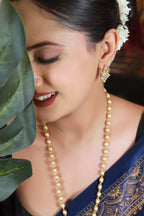 “Lord Ganesha gold-tone pendant necklace set with matching earrings – Damani Jewels”