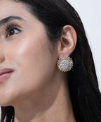 Elegant circular American Diamond earrings with intricate sunburst craftsmanship.