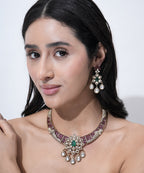 Bridal choker necklace with ruby stones and green centerpiece