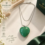 Silver-tone chain with green heart-shaped pendant