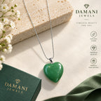 Close-up of polished green heart stone pendant