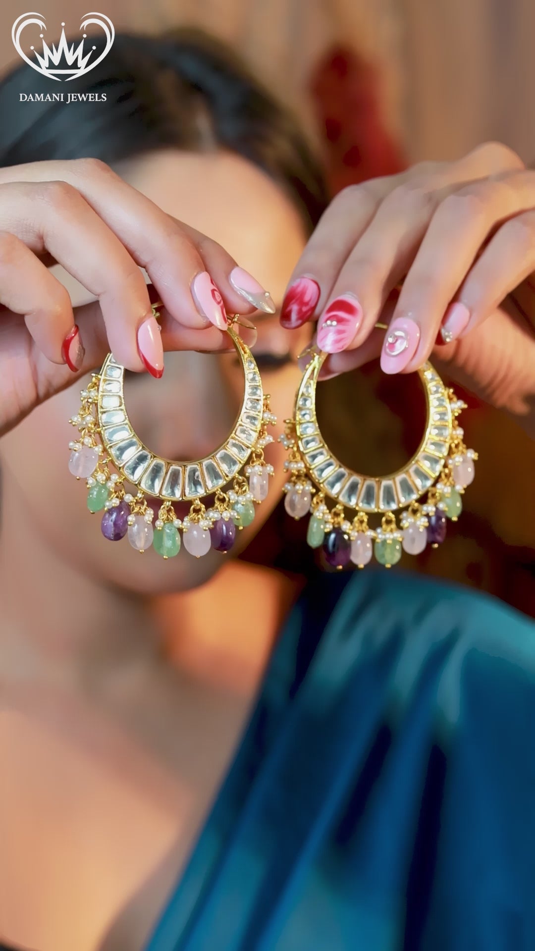 Model wearing Damani Jewels multicolor kundan chandbali hoop earrings – bridal festive jewelry.