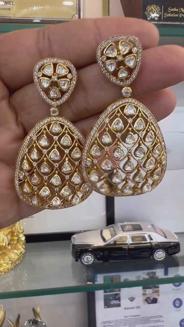 Women's gold-tone teardrop drop earrings styled for a festive or wedding occasion