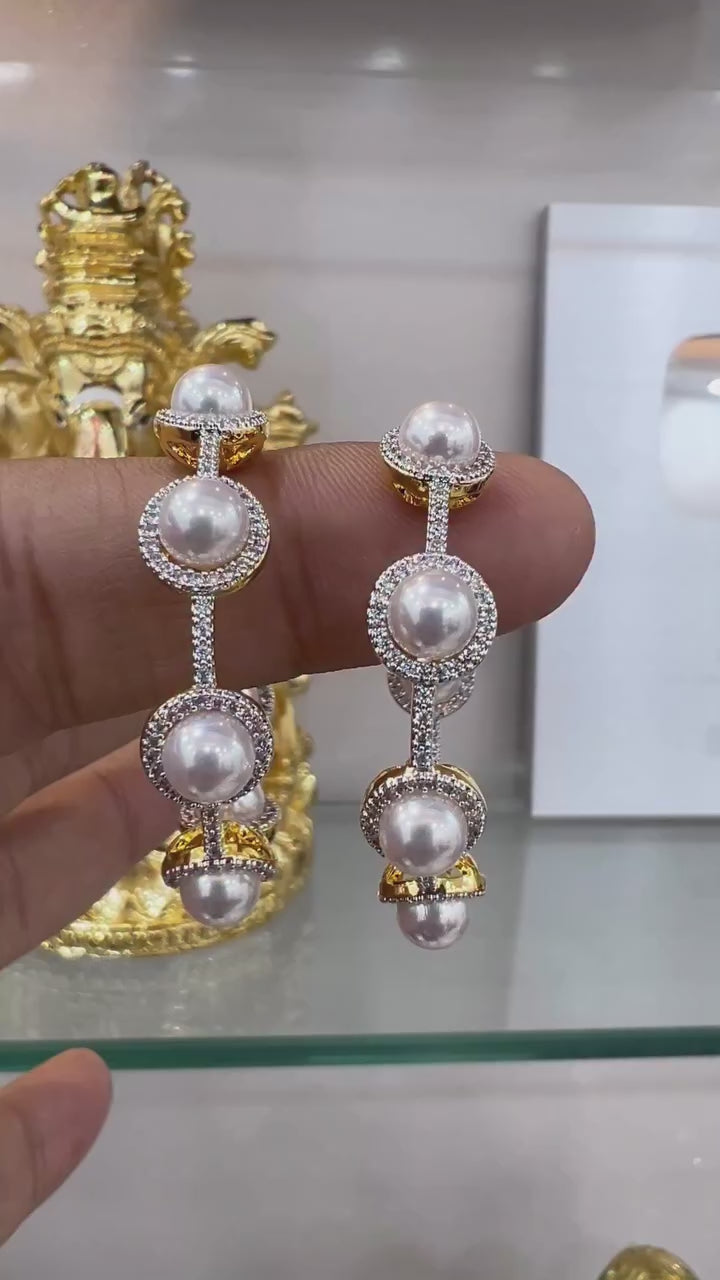 Pearl gold hoop earrings for women with sparkling detailing by Damani Jewels
