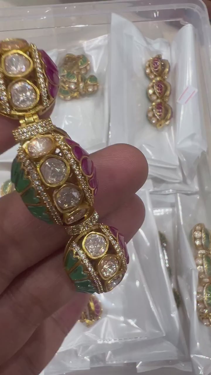 Multicolor moissanite gold bracelet with green and magenta gemstone accents