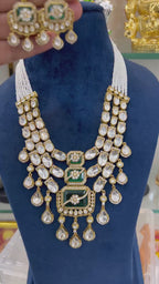 Green Moissanite Kundan necklace set with matching chandelier earrings by Damani Jewels